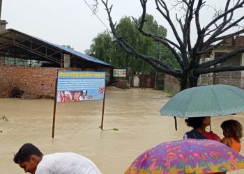 बिहीबारदेखि परेको लगातारको वर्षाले धनुषाको दक्षिणी भेग डुबानमा (फाेटाे फिचर )