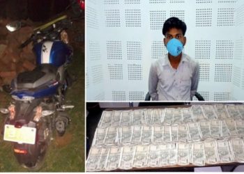 पर्सामा भारतीय नोटसहित एक युवक प क्रा उ